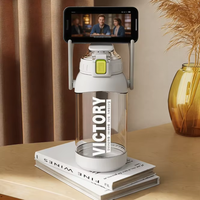 Bouteille d'eau de sport 1600 ml avec support pour téléphone, revêtement anti-fuite, PC sûr, réutilisable, pour boire directement, camping, gym, compatible lave-vaisselle