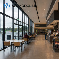 Bâtiment modulaire pour aire de repos routière, structure en acier, revêtement en aluminium, aménagement personnalisé, clé en main, assemblage rapide, infrastructure