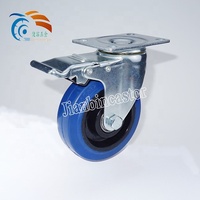 Roue à roulement à billes double en acier industriel avec frein pivotant en caoutchouc élastique 75 mm/125 mm Bleu Capacité de charge de 150 kg