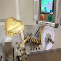 Machine d'emballage de chocolat en forme de cœur avec film métallisé, scellage thermique rapide, personnalisable