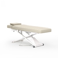 Table de massage électrique de luxe moderne à 3 moteurs, relevable, en cuir PU, avec cadre en acier inoxydable, réglable, haute densité