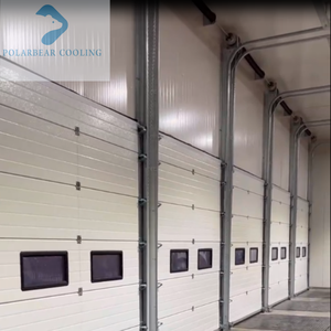 <span class=keywords><strong>Porte</strong></span> <span class=keywords><strong>sectionnelle</strong></span> industrielle isolée et robuste avec dispositifs de sécurité pour entrepôt et quai de chargement - Product Image 1