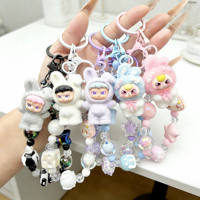Breloque de téléphone Labubu Doll faite à la main, porte-clés perlé rose, accessoire de sac, chaîne de téléphone