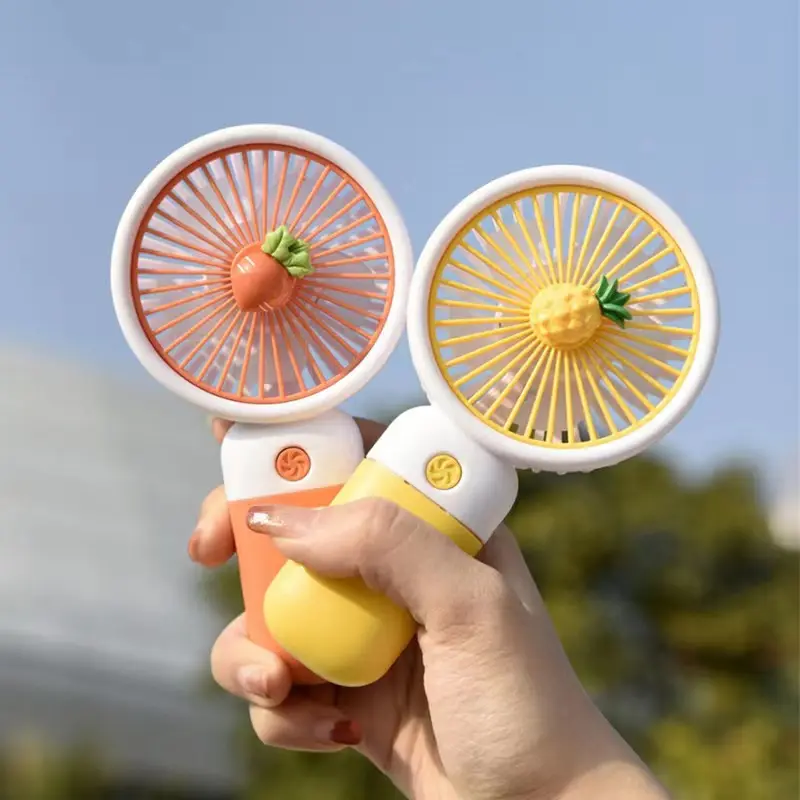 Factory wholesale Fruit flower mini fan portable handheld fan cartoon cute student desktop usb charging fan