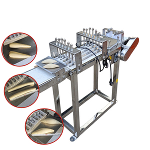 Machine à façonner la pâte automatique, machine à rouler la pâte à pain commerciale, machine à former les pains longs et les baguettes pour boulangerie - Product Image 1