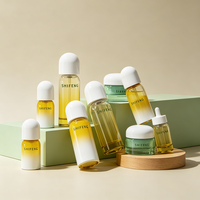 Flacon de sérum anti-âge 30 ml avec bouchon sphérique unique, compte-gouttes en verre, distributeur d'huile pour le visage à la vitamine C de luxe