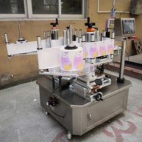 Étiqueteuse de bouteilles semi-automatique pour dispositif d'étiquetage de pot de pot en plastique collant la cruche de boîtes cosmétiques