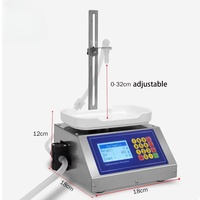 Machine de remplissage semi-automatique quantitative de liquides, type pesage, pour le sous-remplissage de boissons alcoolisées en conserve