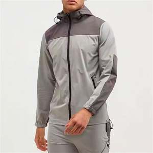 2025 Nueva chaqueta impermeable de poliéster de nailon para deportes al aire libre para correr, cortavientos con cremallera bloqueada de Color ligero, característica a prueba de viento - Product Image 1