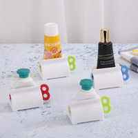 Porte-distributeur de dentifrice animal Tube roulant en plastique Pressoir Extrudeur de dentifrice Accessoires de salle de bain à domicile Fournitures