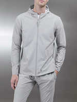 Veste coupe-vent technique légère TN Europe Fit, extensible dans 4 directions, 87 % nylon, 13 % élasthanne, coupe ajustée pour homme, avec capuche réglable