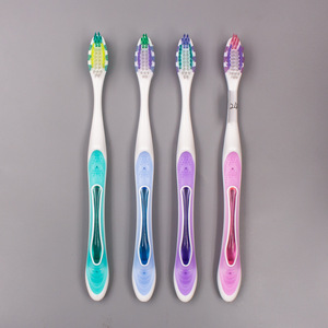 Cepillo de dientes para adultos, cerdas medianas, tira de masaje de nylon para encías, uso doméstico, 17.12g - Product Image 1