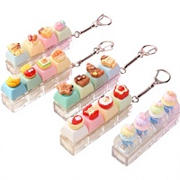 Porte-clés anti-stress créatif LED avec 4 mini-interrupteurs mécaniques, design 3D dessert, pain, ours, en ABS, vente en gros
