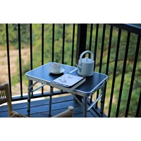 Table de pique-nique pliable moderne en alliage d'aluminium avec hauteur réglable et plateau en maille pour le camping et les repas en plein air dans les parcs