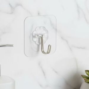 Gancio da parete trasparente adesivo in plastica resistente magico di vendita caldo per bagno e cucina - Product Image 1