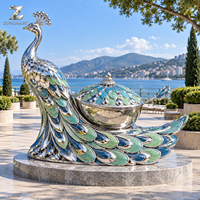 Sculpture d'oiseau paon en métal élégante, polie miroir, personnalisée pour parcs, places, jardins, hôtels et cours paysagères