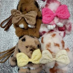 Vente en gros de porte-<span class=keywords><strong>clés</strong></span> en fourrure de lapin Rex véritable arc-en-ciel multicolore, pendentif lapin mignon à pois, accessoires pour porte-<span class=keywords><strong>clés</strong></span> de voiture - Product Image 6