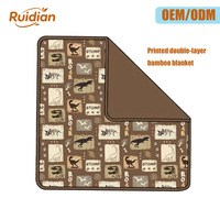 Couverture en bambou double couche personnalisée OEM ODM, imprimée sur le devant et unie au dos, douce et respirante, pour lit de bébé
