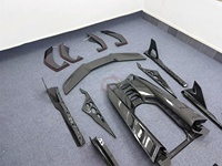 Kit Carrosserie Complet en Fibre de Carbone Sec Style DK de Haute Qualité pour Lamborghini Revuelto : Lame Avant, Jupes Latérales, Diffuseur Arrière, Aileron Arrière et Cache Moteur