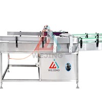 Machine de remplissage automatique pneumatique haute performance pour aérosols cosmétiques, peintures, parfums et sprays corporels, avec capacité de 1 pouce de diamètre.