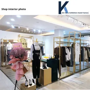 Rak <span class=keywords><strong>Display</strong></span> toko pakaian ritel kelas atas dengan baja tahan karat Multi lapisan rak berdiri lantai untuk pakaian pria - Product Image 4