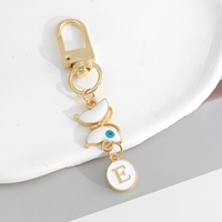 Porte-clés Lettre en Alliage 'Œil de Démon Papillon' (Lettres A-Z), Porte-clés de Couple, Accessoire Suspendu, Décoration pour Sac à Dos