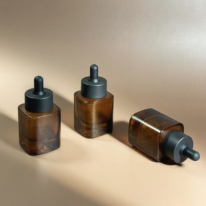 Eco Friendly Custom 30ml Amber Glass Dropper <b>Bottle</b> for Essential Oils with Unique Bottom Design - Product Image 1