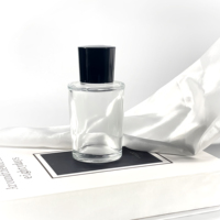 Bouteilles en verre rondes uniques en forme de cylindre 50ml 75ml conteneur cosmétique atomiseur bouteille d'huile d'olive bouteille de parfum en verre