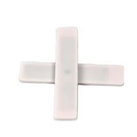 Étiquette de blanchisserie en silicone RFID OEM 860 ~ 960mhz avec longue plage de lecture pour les opérations de blanchisserie à grande échelle