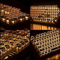 Clavier de jeu mécanique de style machine à écrire OEM ODM avec des touches rondes dorées rétro et un rétroéclairage LED orange
