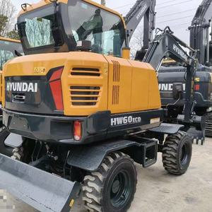 Excavatrice sur pneus Hyundai HW60ECO d'occasion, 6 tonnes, moteur Yanmar, système hydraulique d'origine, mini-pelle pour travaux municipaux - Product Image 2
