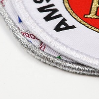 Écussons tissés personnalisés en fil métallique or et argent pour vêtements de sport – Fabricant de logos sur mesure