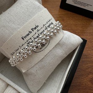 สร้อยข้อมือเงินแท้ S925 สไตล์เกาหลี ประดับลูกปัดถักสามชั้น ดีไซน์เกาหลีสุดฮิต สไตล์ INS ขายส่ง - Product Image 1