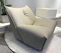 Fauteuil de sol moderne en similicuir PU sans accoudoirs, rembourré en éponge douce, pivotant, résistant à l'eau et facile d'entretien pour salon et chambre à coucher