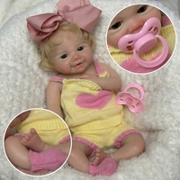 Poupée bébé réaliste en silicone pleine grandeur de 13 pouces avec cheveux bouclés, accessoires complets et boîte cadeau pour filles