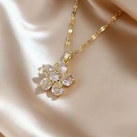 Nouvelle chaîne de clavicule rotative avec fleurs en zircon coloré micro-incrustées, style européen et américain, tendance et à la mode