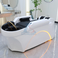 Lit de shampoing de massage électrique avec circulation d'eau pour salon de coiffure moderne et confortable