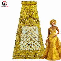 Tissu en dentelle perlée de haute qualité en gros pour robe de mariée, tissu en dentelle filet élégant avec perles et paillettes pour occasions haut de gamme