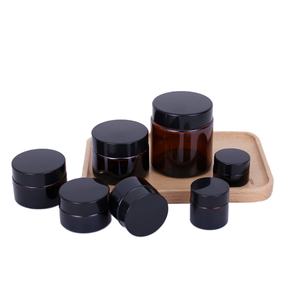 Venta al por Mayor de Frascos de Vidrio Marrón Crema de 5g, 10g, 15g, 30g, 50g y 100g con Tapa de Plástico Negra para Bálsamo Labial y Envases de Cosméticos - Product Image 1