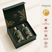 Boîte cadeau double gin personnalisée, boîte rigide vert émeraude avec feuille d'ormeau dorée, emballage pour deux bouteilles de gin