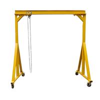 Mini-grue portique pliable et mobile sur roues pour l'assemblage et le levage de machines en garage