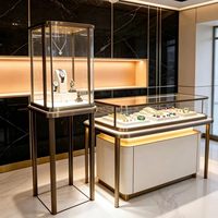 Vitrine à bijoux éco-responsable avec éclairage LED, construction durable, dimensions personnalisables, utilisation polyvalente pour la vente au détail et la décoration intérieure