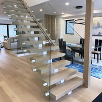 Escalier moderne à monopoutre pour intérieur de maison de luxe avec design à monte-escalier ouvert et support en acier robuste