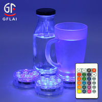 Producto de luz de piscina LED subacuática impermeable IR 24 teclas 16 colores con pilas Puck luces LED sumergibles con control remoto