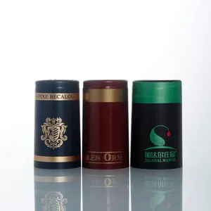 hot sale custom top embossed logo aluminum plastic wine capsule polylaminate capsule for liquor glass bottle