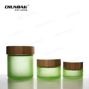 Frascos de vidrio en relieve de borosilicato con tapa de bambú, loción personalizada de fábrica de China, Color único mate, 50ml, 3oz, 5oz, 180ml