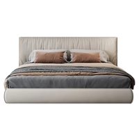 Lit double italien minimaliste de luxe léger en cuir, avec revêtement enveloppant en cuir de vachette première couche et rembourrage souple, avec rangement, pour chambre principale