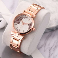 Jam Tangan Wanita Fashion Motif Daun Pita dengan Mesin Quartz Ramah Lingkungan, Model Tali Mesh, Laris untuk Perdagangan Lintas Negara