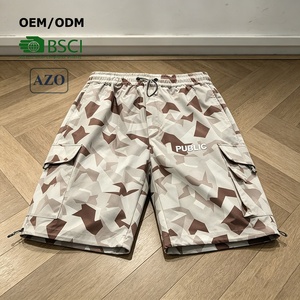ผู้ผลิตเสื้อผ้า OEM รับผลิตกางเกงขาสั้นผู้ชายแบบสั่งทำพิเศษ พิมพ์ลายแบบ Sublimation หลายกระเป๋า ปักลายแบบ Flat Embroidery ทรงหลวม สไตล์ลำลอง ลายพราง สำหรับฤดูร้อน - Product Image 1