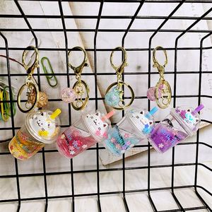 Llavero Personalizado con Diseño de Flor de Cerezo, Gato y Estrella, con Líquido Brillante y Flotante, para Mujeres y Niños, Decorativo - Product Image 1